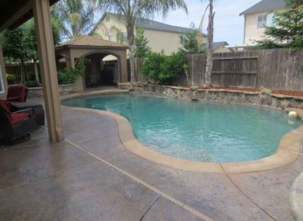this is a picture of concrete pool deck contractor